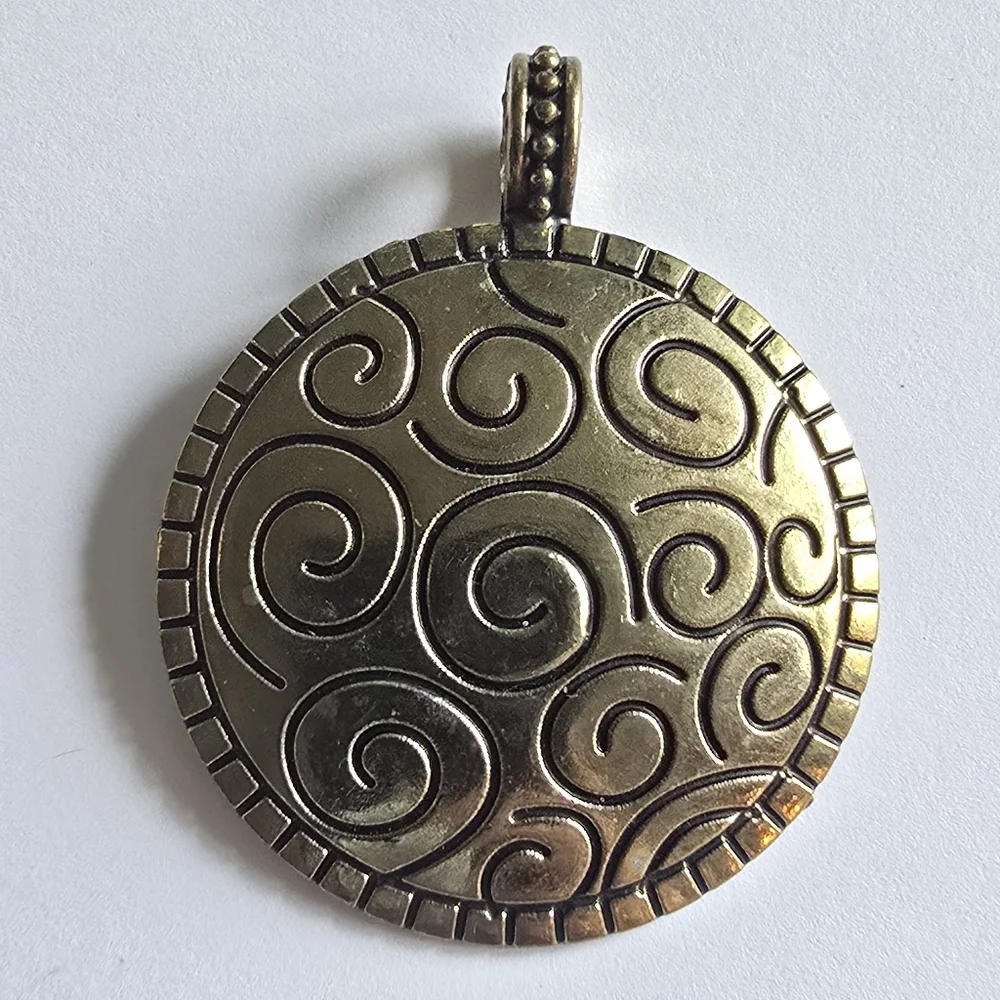 Spiral pendant gold tone domed circle big bold boho